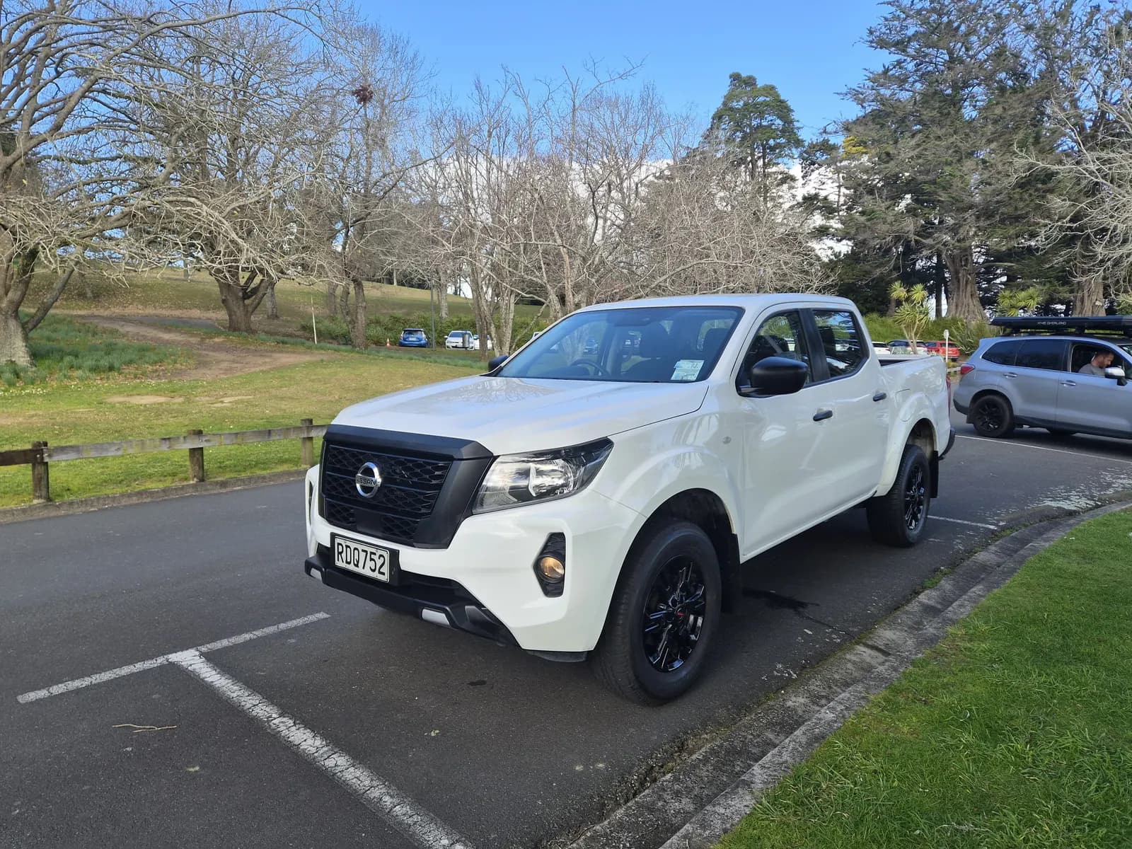 White 2025 Nissan Navara, front three-quarter view